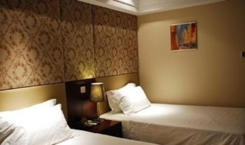 Baolong Homelike Hotel - Wusong Branch Shanghai Room photo
